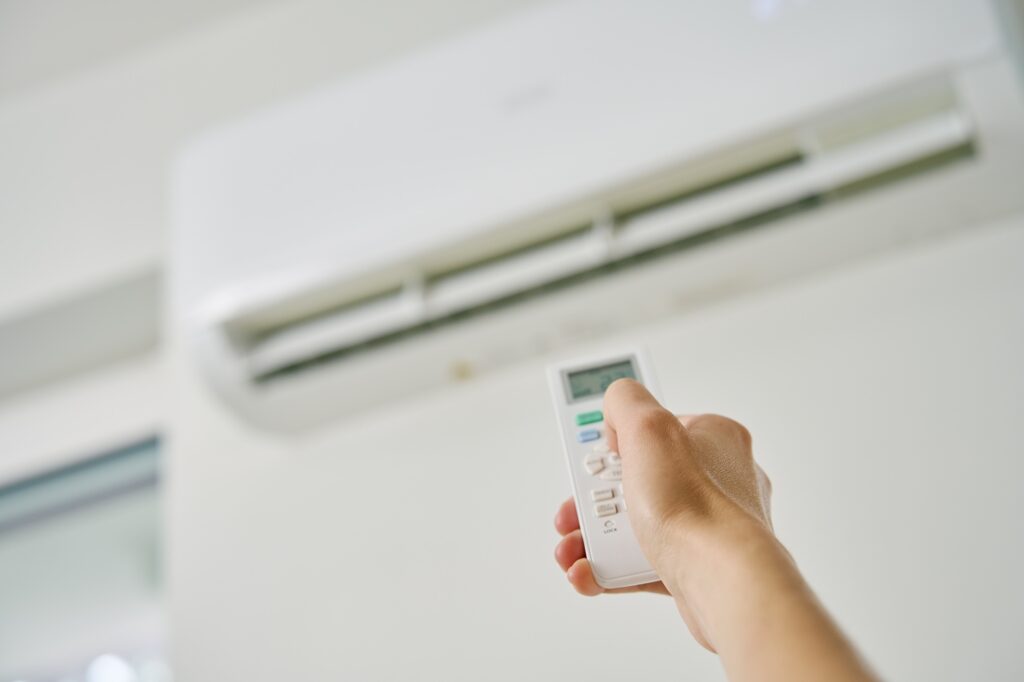 Adjusting Air Conditioner Temperature with Remote Control